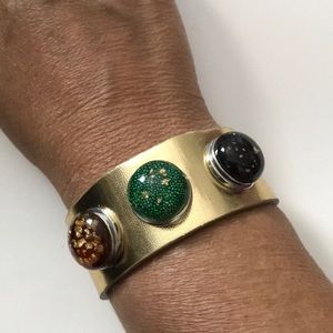 Gold colored leather 3 snap bracelet with snaps